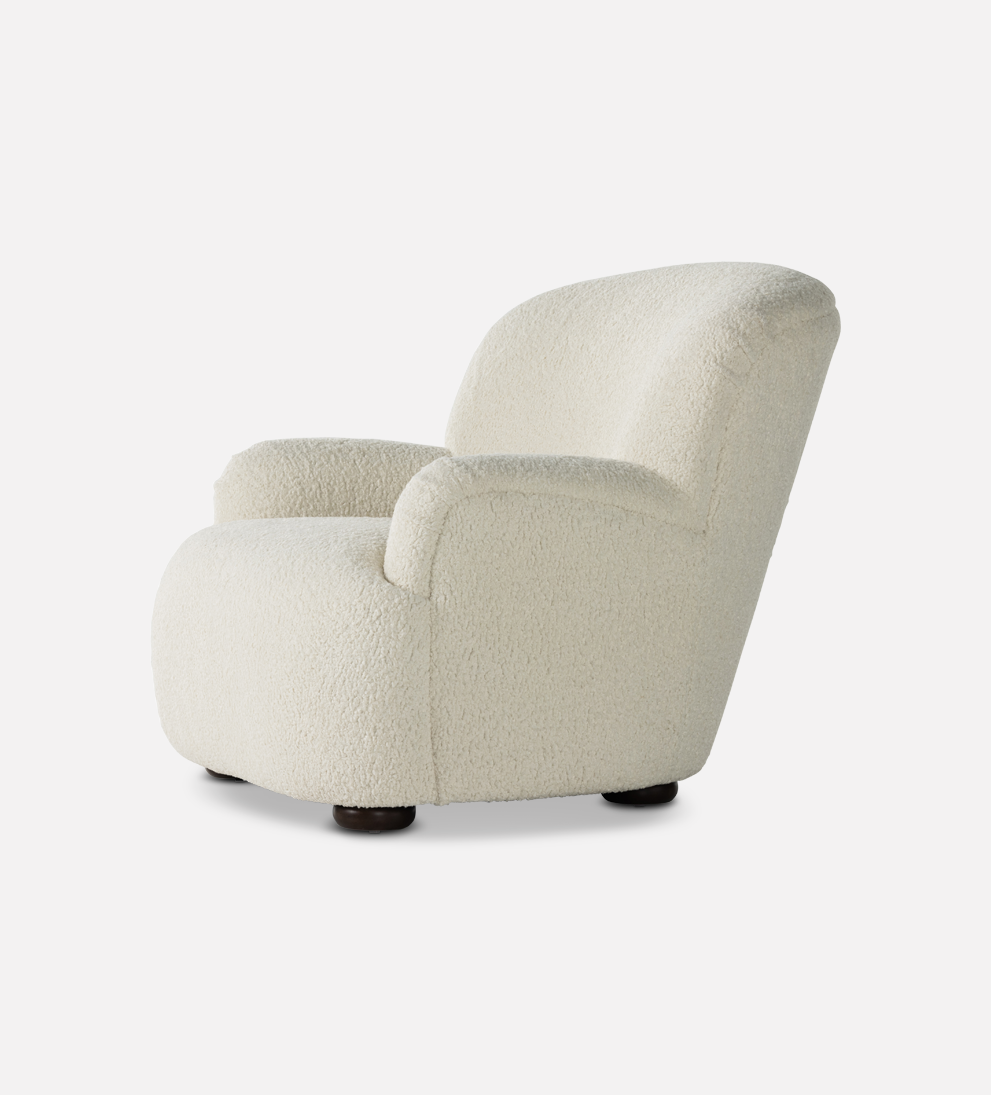 Burke Chair Natural - Add some trendy style to your home with our Burke Chair. - Crafted from sheepskin and designed with a high wing back, this curvy