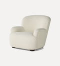 Burke Chair Natural - Add some trendy style to your home with our Burke Chair. - Crafted from sheepskin and designed with a high wing back, this curvy