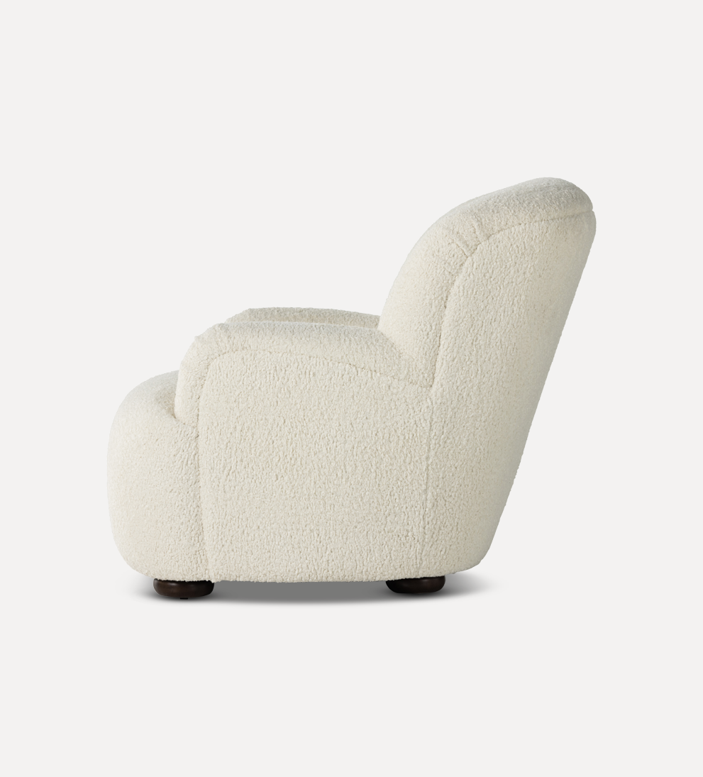 Burke Chair Natural - Add some trendy style to your home with our Burke Chair. - Crafted from sheepskin and designed with a high wing back, this curvy