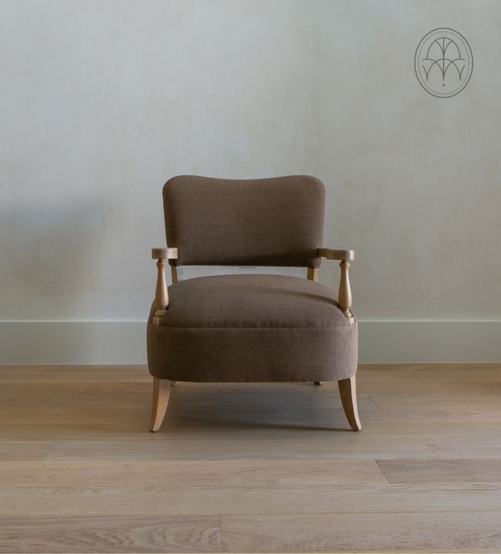 Betty Lounge Chair - Traditional meets contemporary in the Betty Lounge Chair. - I love the curved arms and turned wood spindles of this chair.