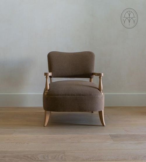 Betty Lounge Chair - Traditional meets contemporary in the Betty Lounge Chair. - I love the curved arms and turned wood spindles of this chair.