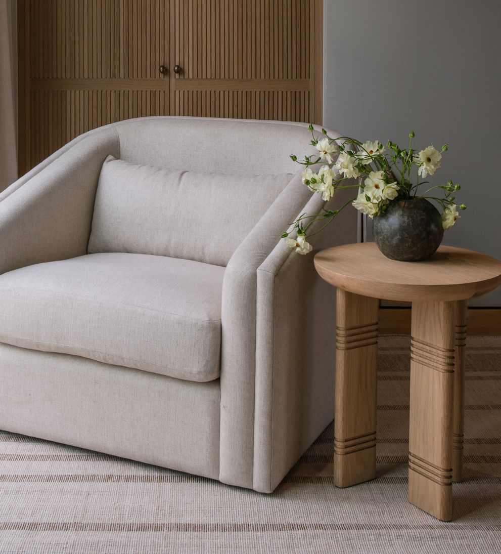 Siena Side Table - Dimensions: 18 L x 18 W x 22 H \ Weight: 21 lbsThe Siena Side Table is a study in sculptural simplicity and subtle detail.