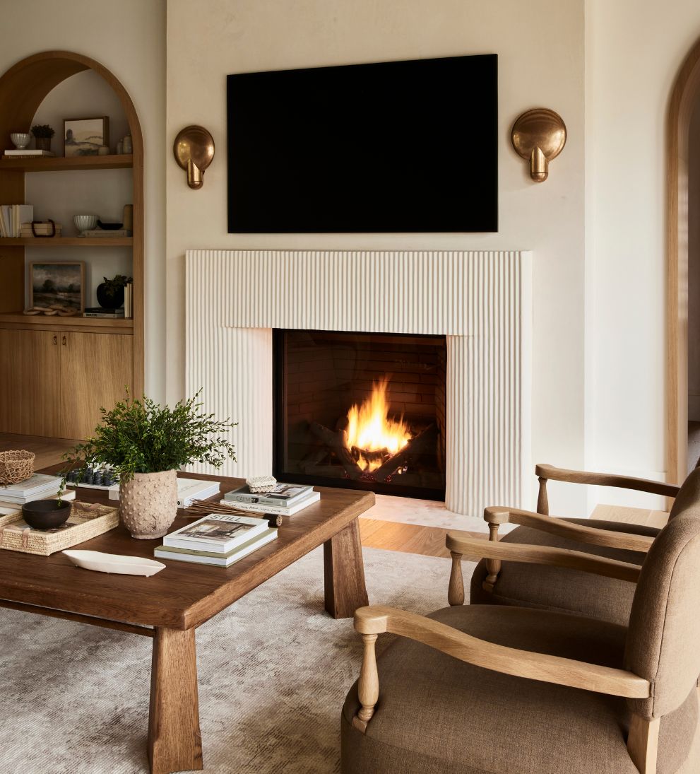 Betty Lounge Chair - Traditional meets contemporary in the Betty Lounge Chair. - I love the curved arms and turned wood spindles of this chair.