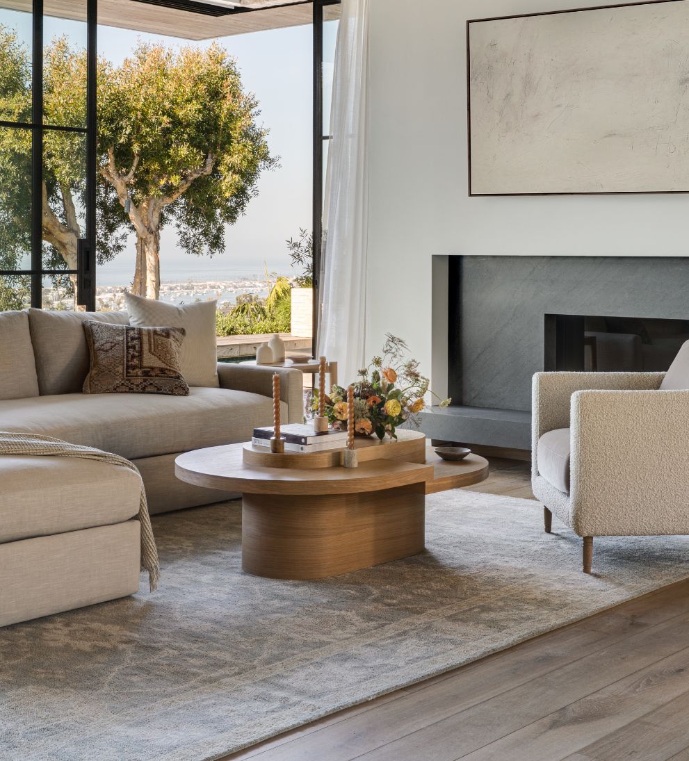 Emma White Oak Tiered Coffee Table - This asymmetrical top coffee table will bring a creative touch to any area - talk about a conversation starter!