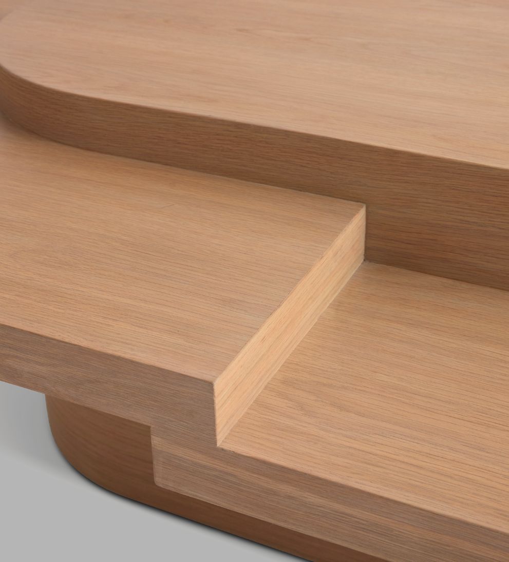 Emma White Oak Tiered Coffee Table - This asymmetrical top coffee table will bring a creative touch to any area - talk about a conversation starter!