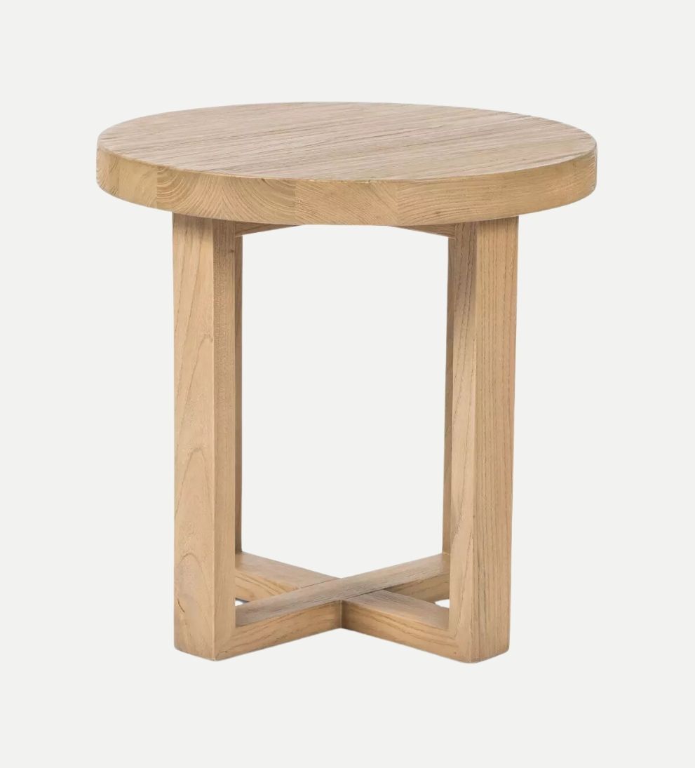 Liv End Table - Introducing the Liv End Table! - Crafted from natural nettlewood, its sturdy, cross-style base supports a rounded tabletop with a soft