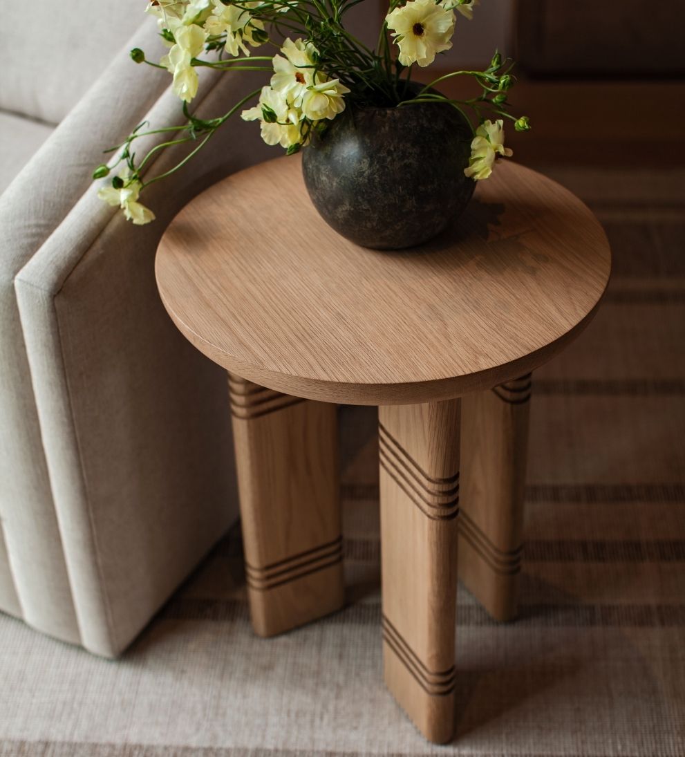 Siena Side Table - Dimensions: 18 L x 18 W x 22 H \ Weight: 21 lbsThe Siena Side Table is a study in sculptural simplicity and subtle detail.