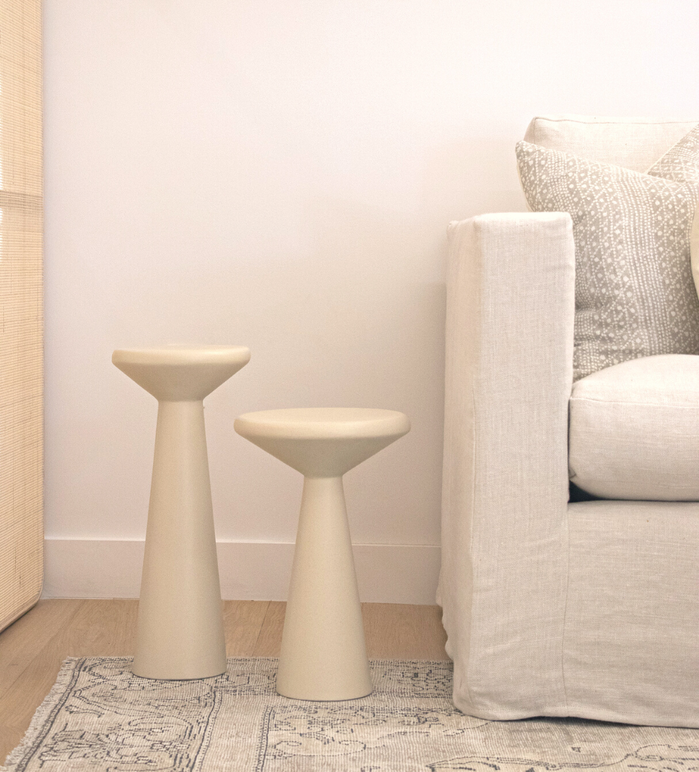 Pomponio Side Tables - Sleek concrete accent tables are staggered in height and width for a variety of styling. - Use as a sophisticated pedestal to